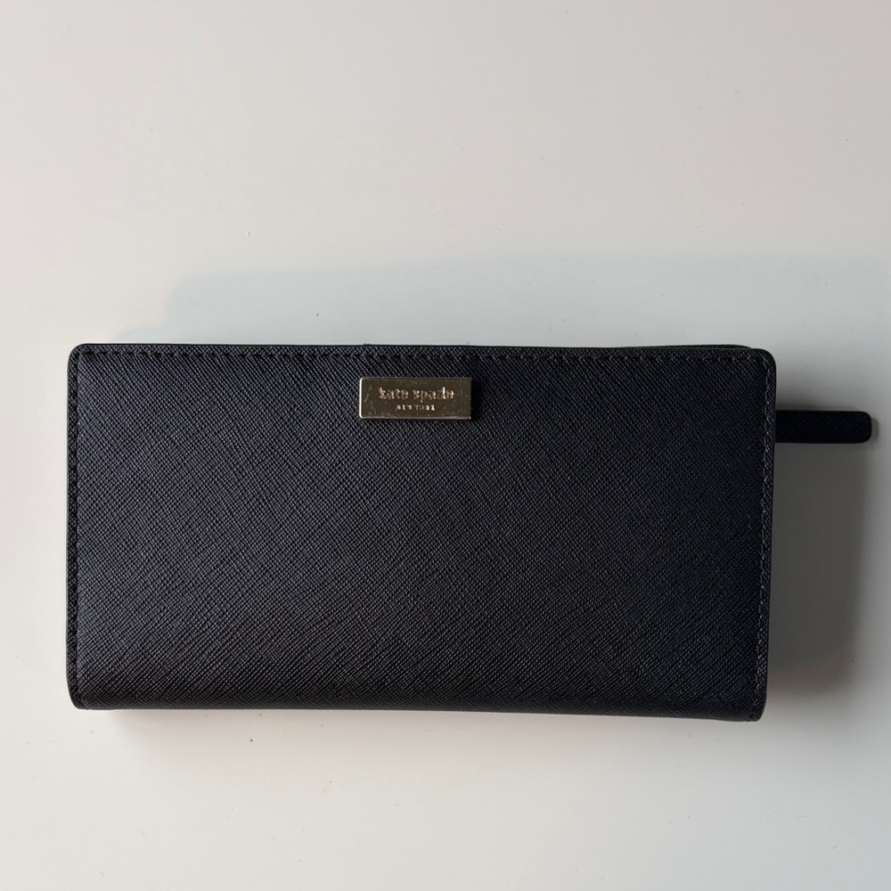 kate spade black saffiano zip-around wallet with gold logo